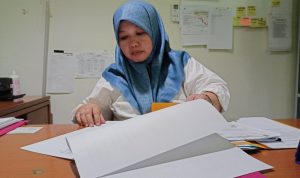 Analis Kebijakan Ahli Muda, Bidang Peningkatan Prestasi Olahraga, Dispora Kaltim, Enok Sahada.